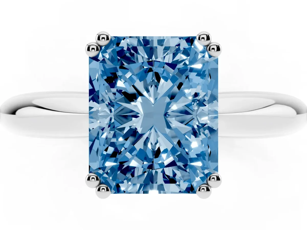 Fancy Blue Radiant Cut Cut Solitaire Engagement Ring with Tapered Band and Four-Prong Setting White gold