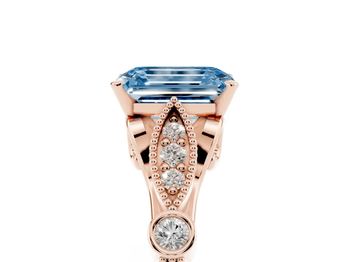 Fancy Blue Emerald Cut Cut Diamond with Milgrain Marquise and Bezel Accents on a Solitaire Band with Prong Setting Rose gold