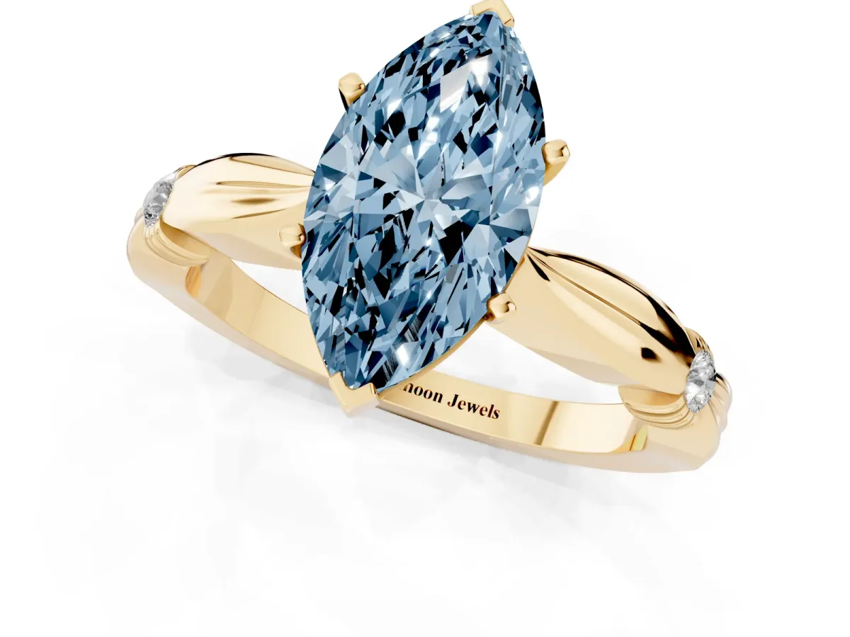 Fancy Blue Marquise Cut Solitaire Diamond Twisted Band with Four-Prong Setting Yellow gold