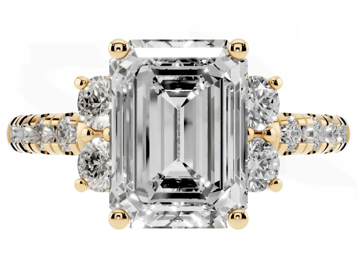 Emerald Cut Diamond Three-Stone Pave Band with Four-Prong Setting Yellow gold