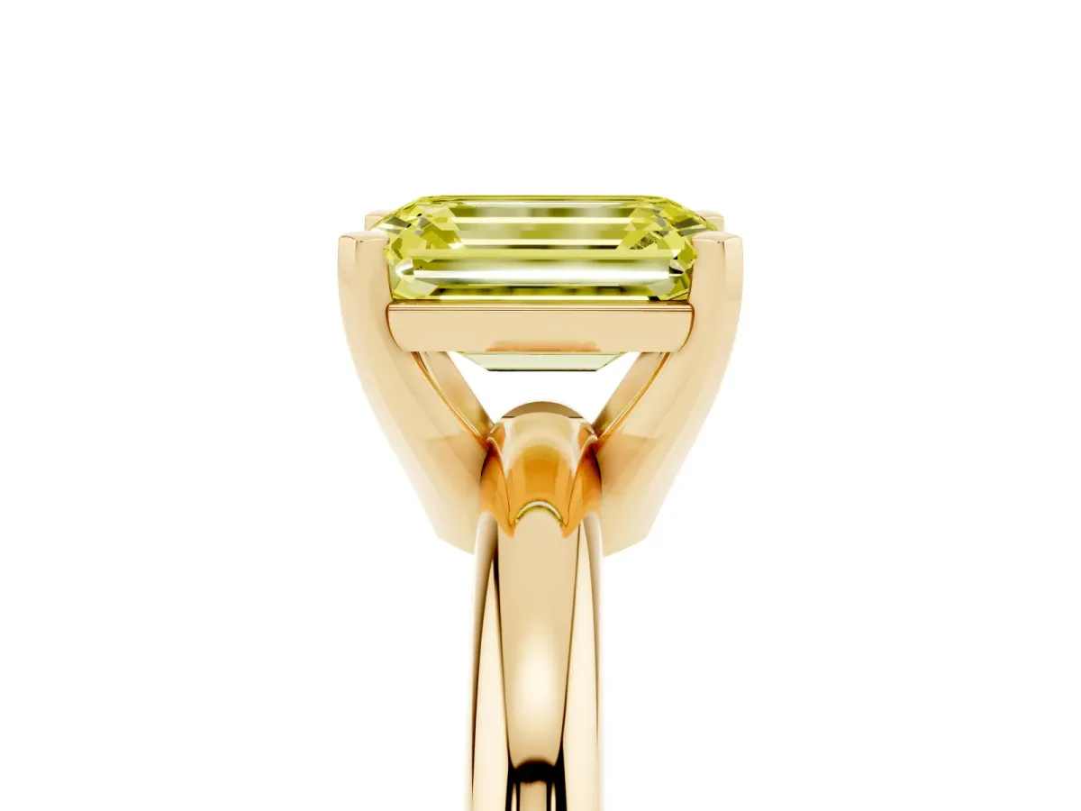Fancy Yellow Emerald Cut Diamond Solitaire Engagement Ring with Round Band and Four-Prong Setting Yellow gold