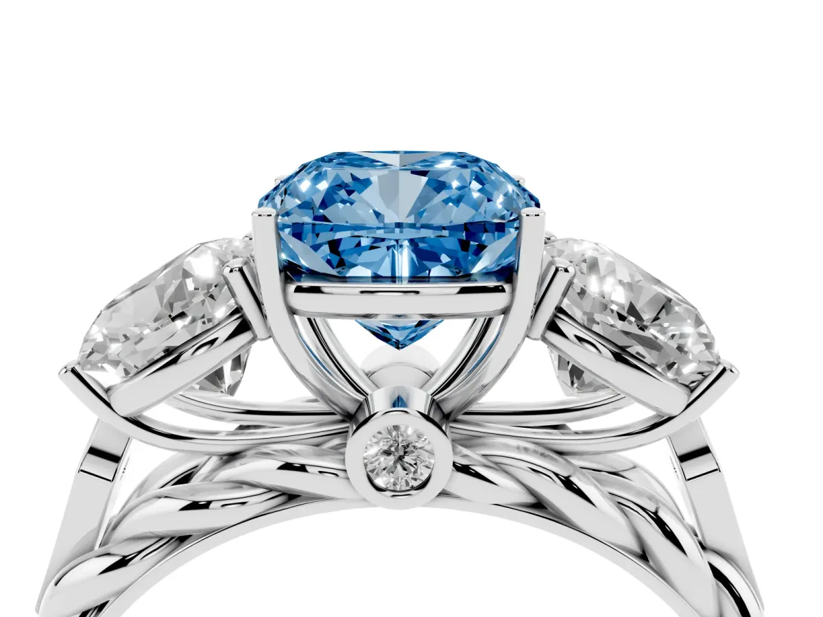 Fancy Blue Three-Stone Cushion Cut Diamond Braided Band Ring with Four-Prong Setting Platinum