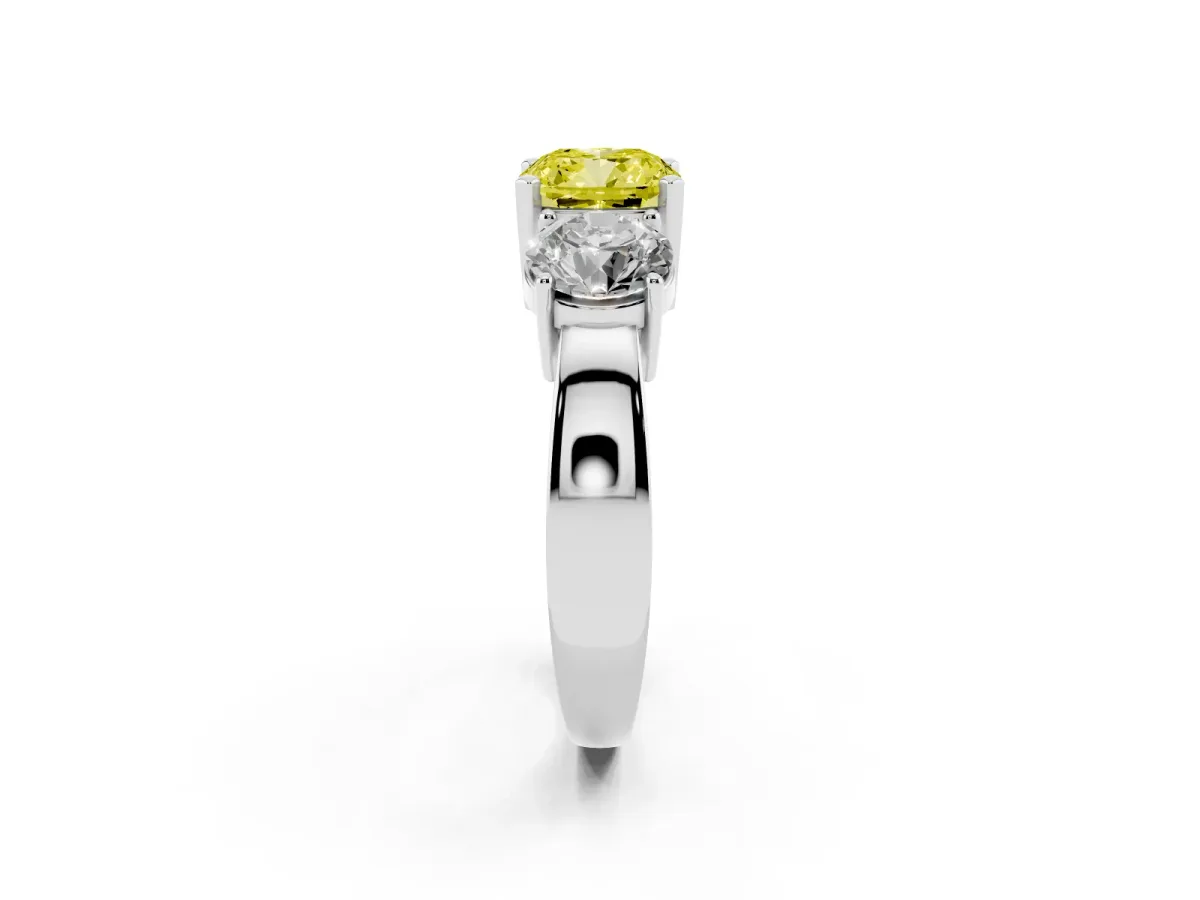 Fancy Yellow Three-Stone Cushion Cut Diamond Ring with Round Side Stones, Classic Band, and Four-Prong Setting Silver