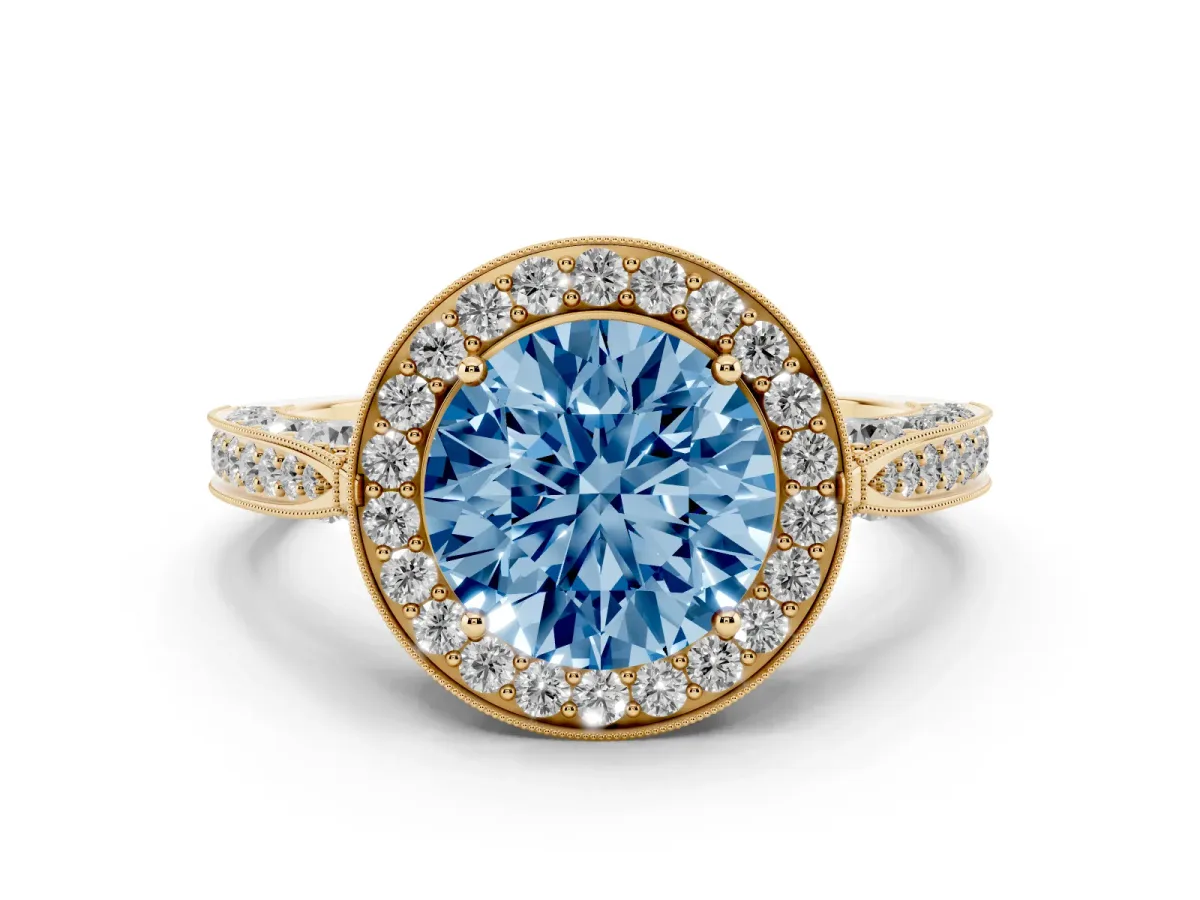 Fancy Blue Round Cut Halo Diamond Engagement Ring with Split Shank Band and Four-Prong Setting Yellow gold