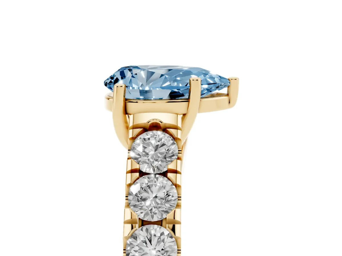 Fancy Blue Pear Cut Cut Diamond Solitaire Ring with Micro Pave Band and Prong Setting Yellow gold