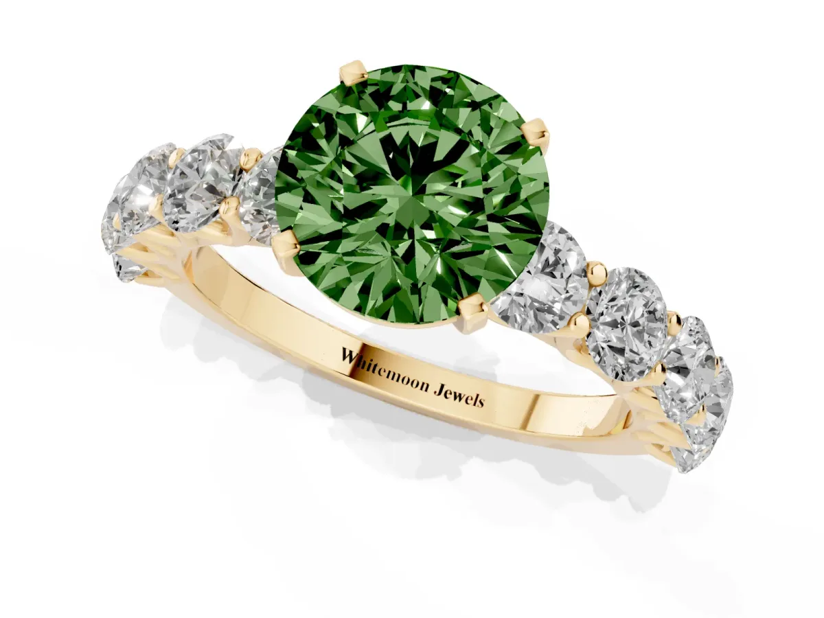 Fancy Green Round Cut Diamond Prong Setting with Side Stones on a Pave Band Yellow gold