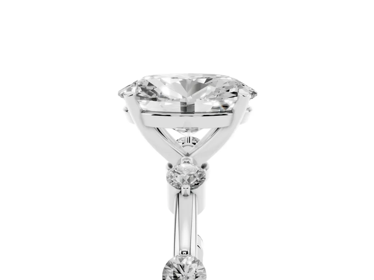 Oval Cut Solitaire Diamond Ring with Bezel Set Side Stones and Prong Setting Platinum