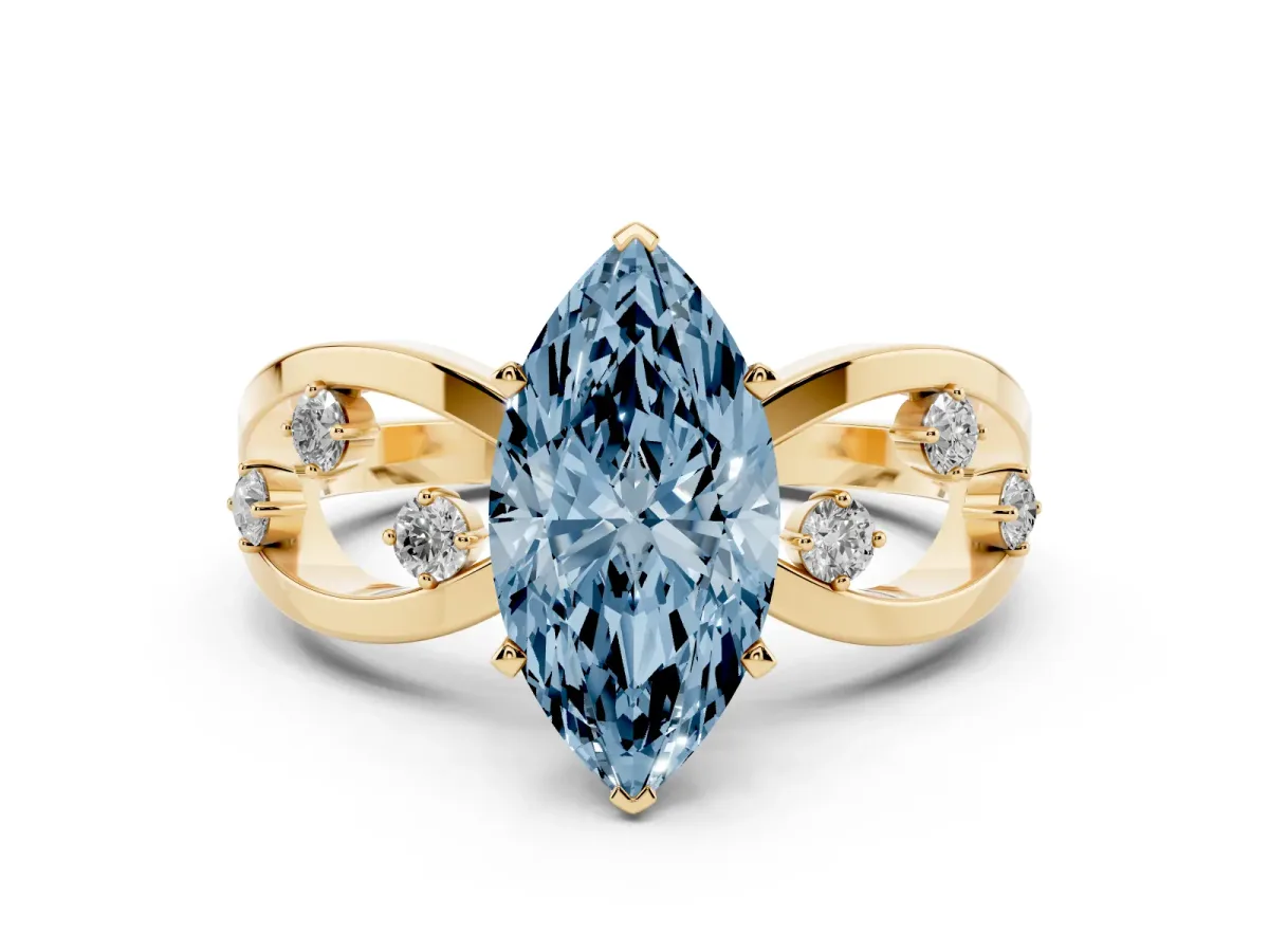 Fancy Blue Marquise Cut Cut Solitaire Diamond with Side Stones on Criss-Cross Band and Four-Prong Setting Yellow gold
