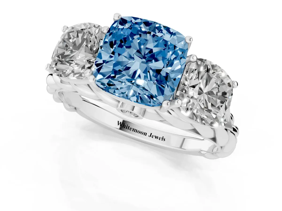 Fancy Blue Three-Stone Cushion Cut Diamond Braided Band Ring with Four-Prong Setting Platinum