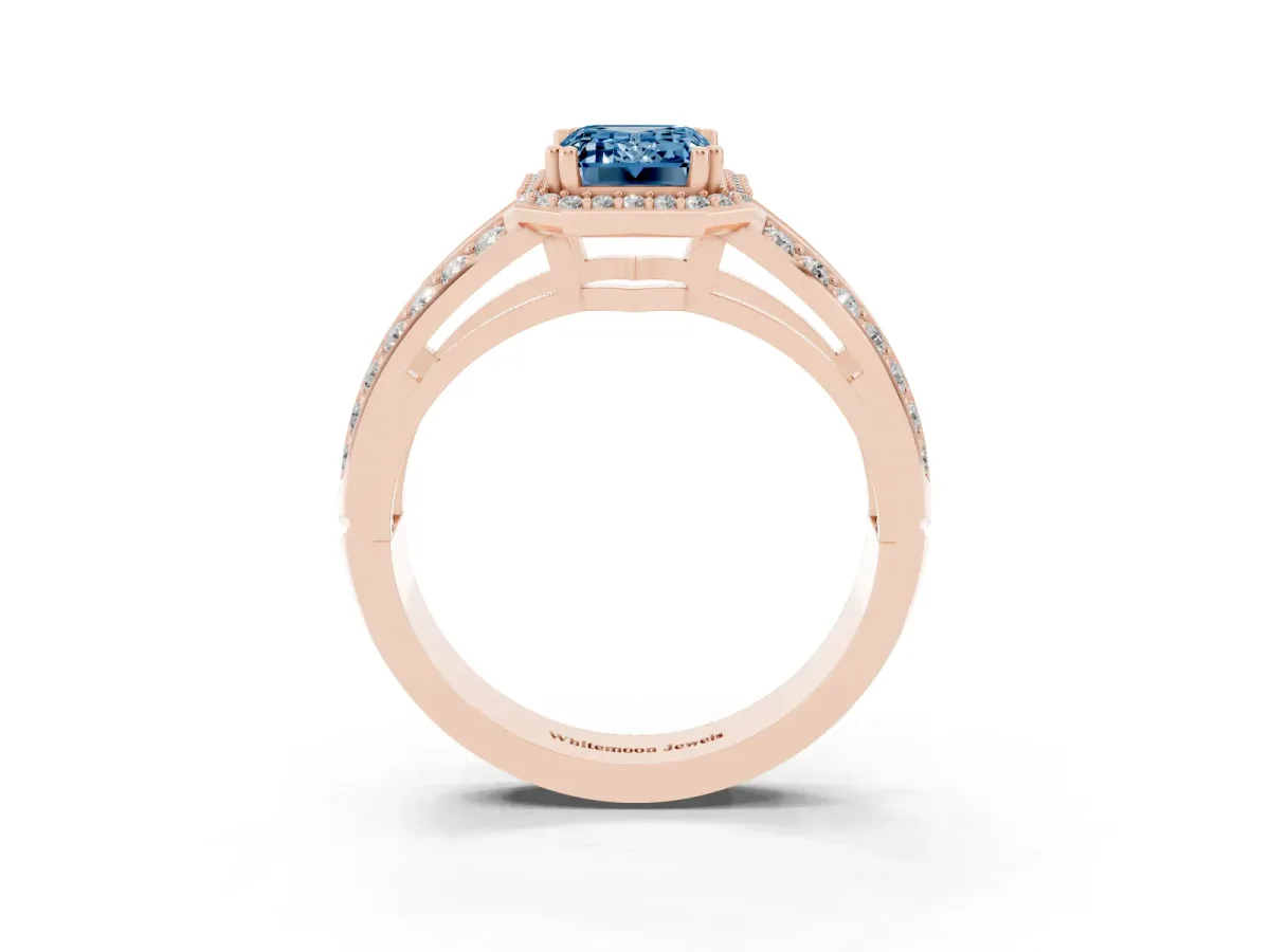 Fancy Blue Emerald Cut Diamond Halo Ring with Split Shank Pavé Band and Four-Prong Setting Rose gold