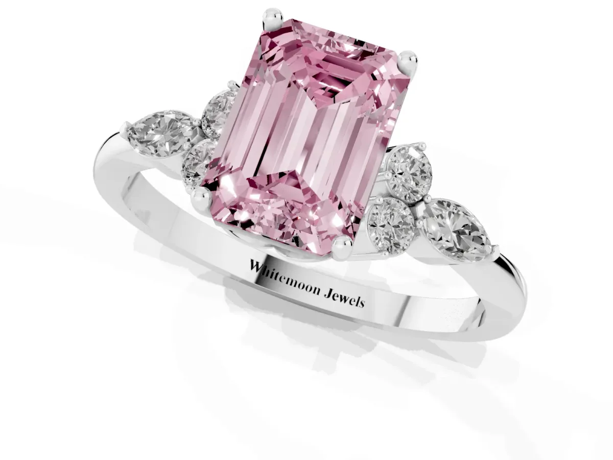 Fancy Pink Emerald Cut Brilliant Diamond Solitaire Ring with Pear Side Stones and Four-Prong Setting Platinum