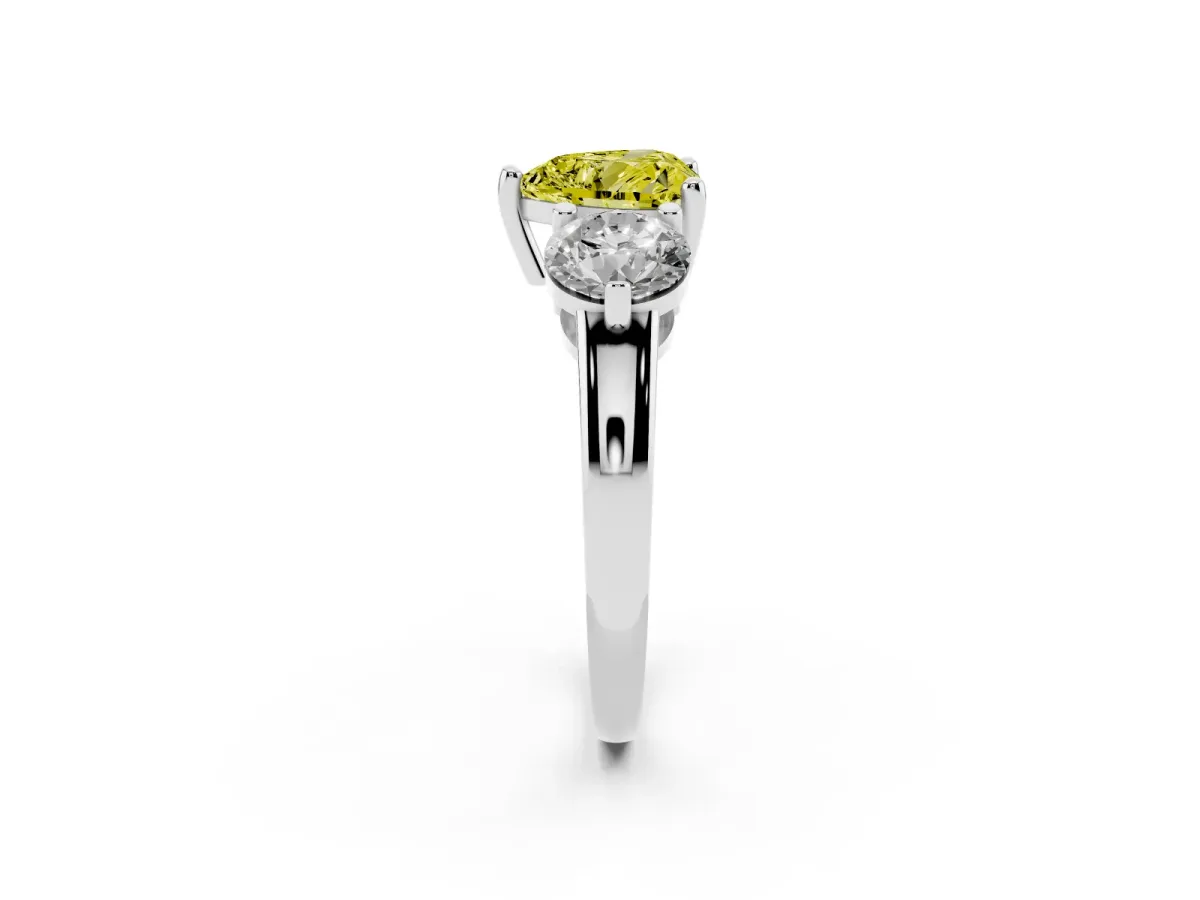 Fancy Yellow Three-Stone Heart Cut Brilliant Cut Solitaire Ring with Prong Setting on a Classic Band Silver