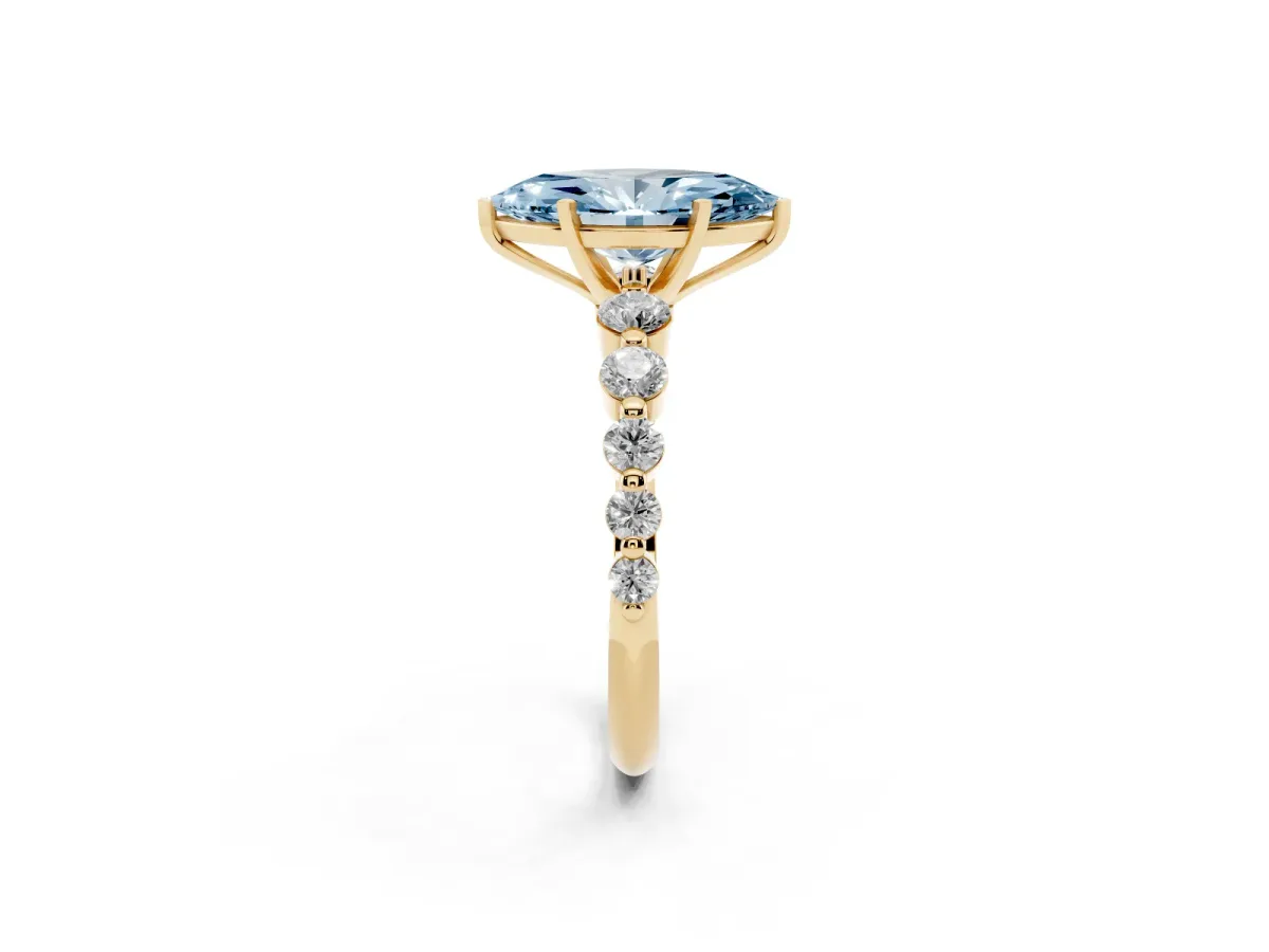 Fancy Blue Marquise Cut Solitaire Diamond Ring with Pave Band and Four-Prong Setting Yellow gold