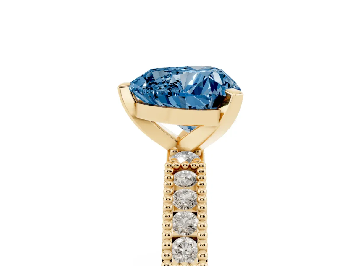 Fancy Blue Heart Cut Solitaire with Pavé Band and Four-Prong Setting Yellow gold