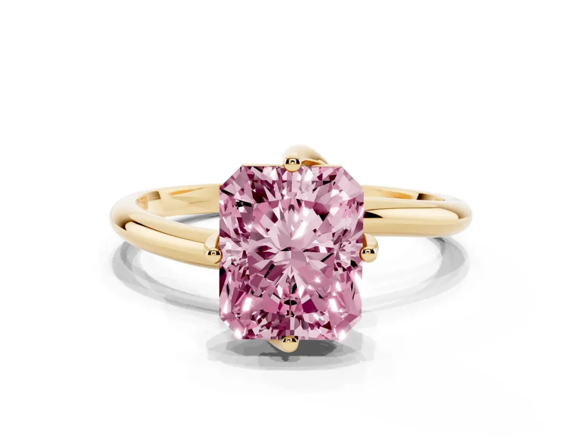 Fancy Pink Radiant Cut Diamond Solitaire Engagement Ring with Four-Prong Setting and Classic Band Yellow gold