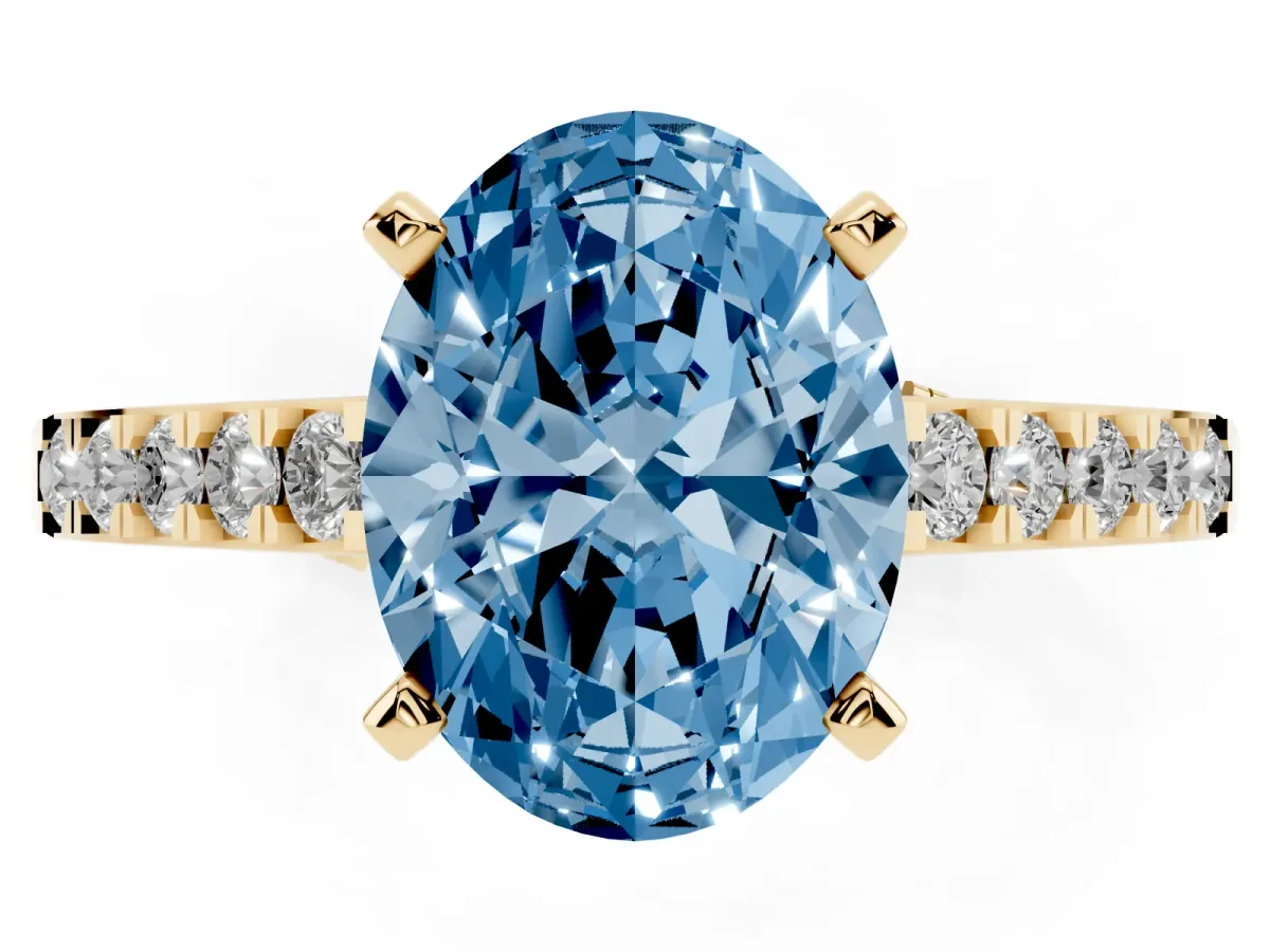 Fancy Blue Oval Cut Diamond Solitaire Ring with Crossover Gallery and Round Pavé Band Yellow gold