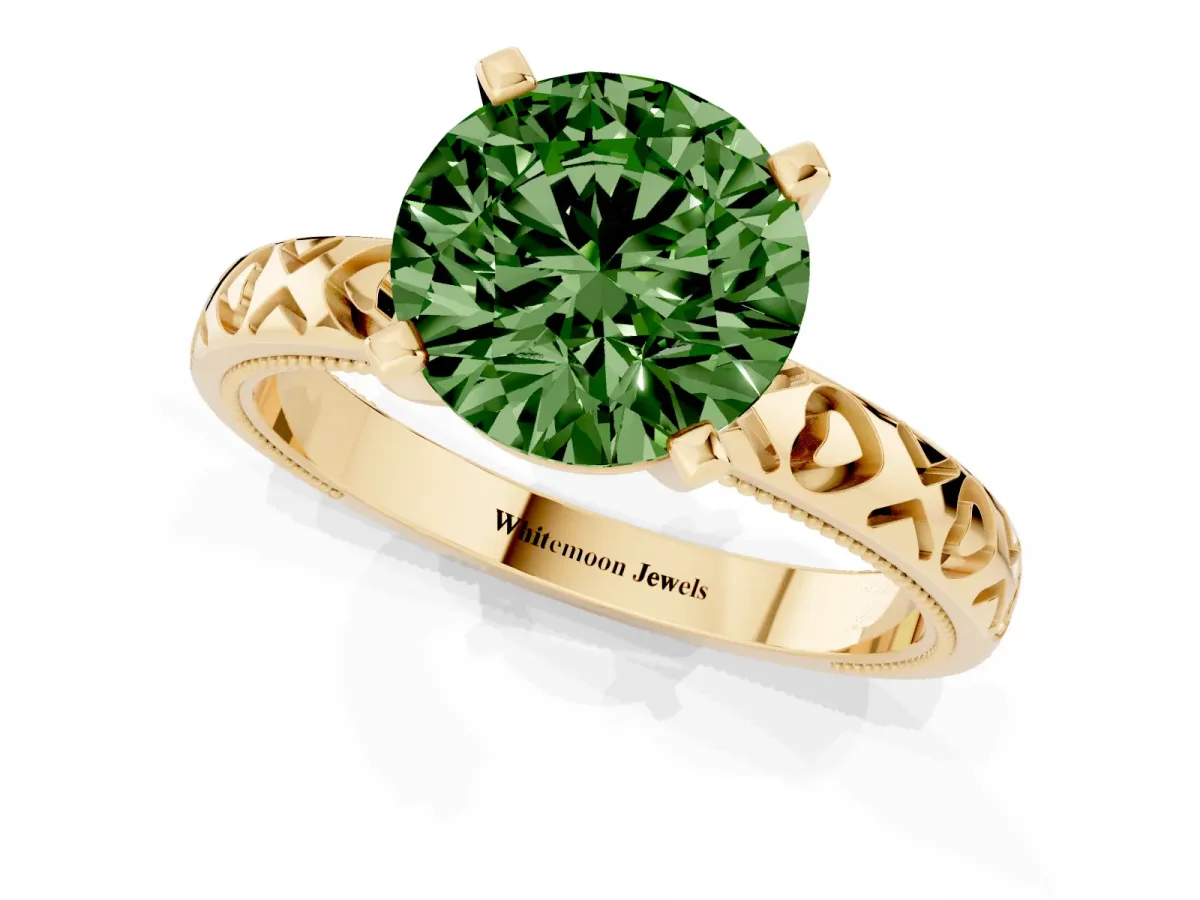 Fancy Green Round Cut Solitaire Diamond Engagement Ring with XO Engraved Band and Four-Prong Setting Yellow gold