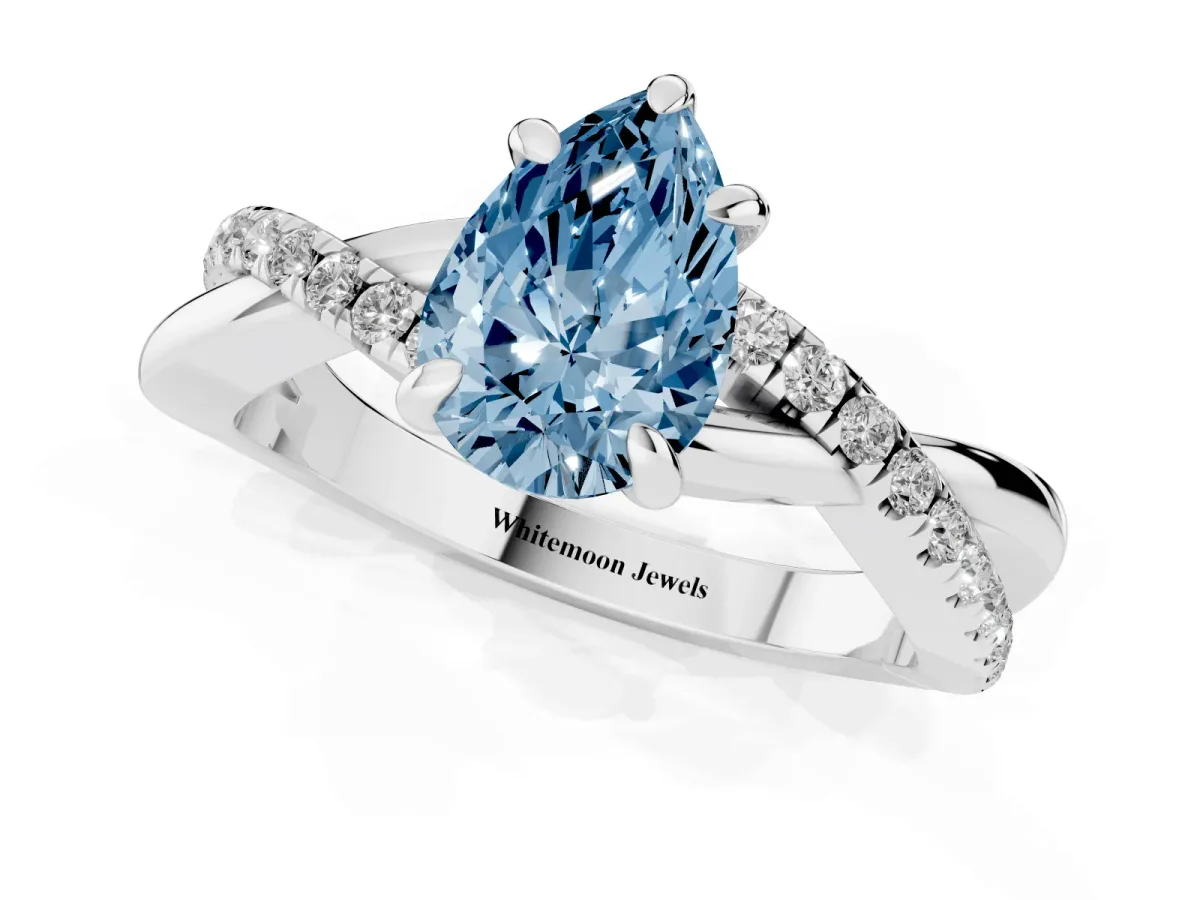 Fancy Blue Pear Cut Cut Diamond Twist Band Solitaire with Prong Setting Silver