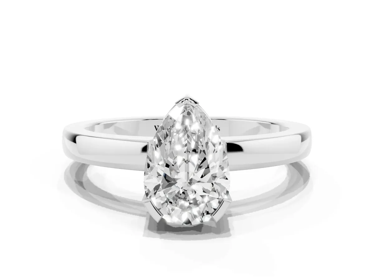 Pear Cut Cut Solitaire Ring with Four-Prong Setting and Classic Band Platinum