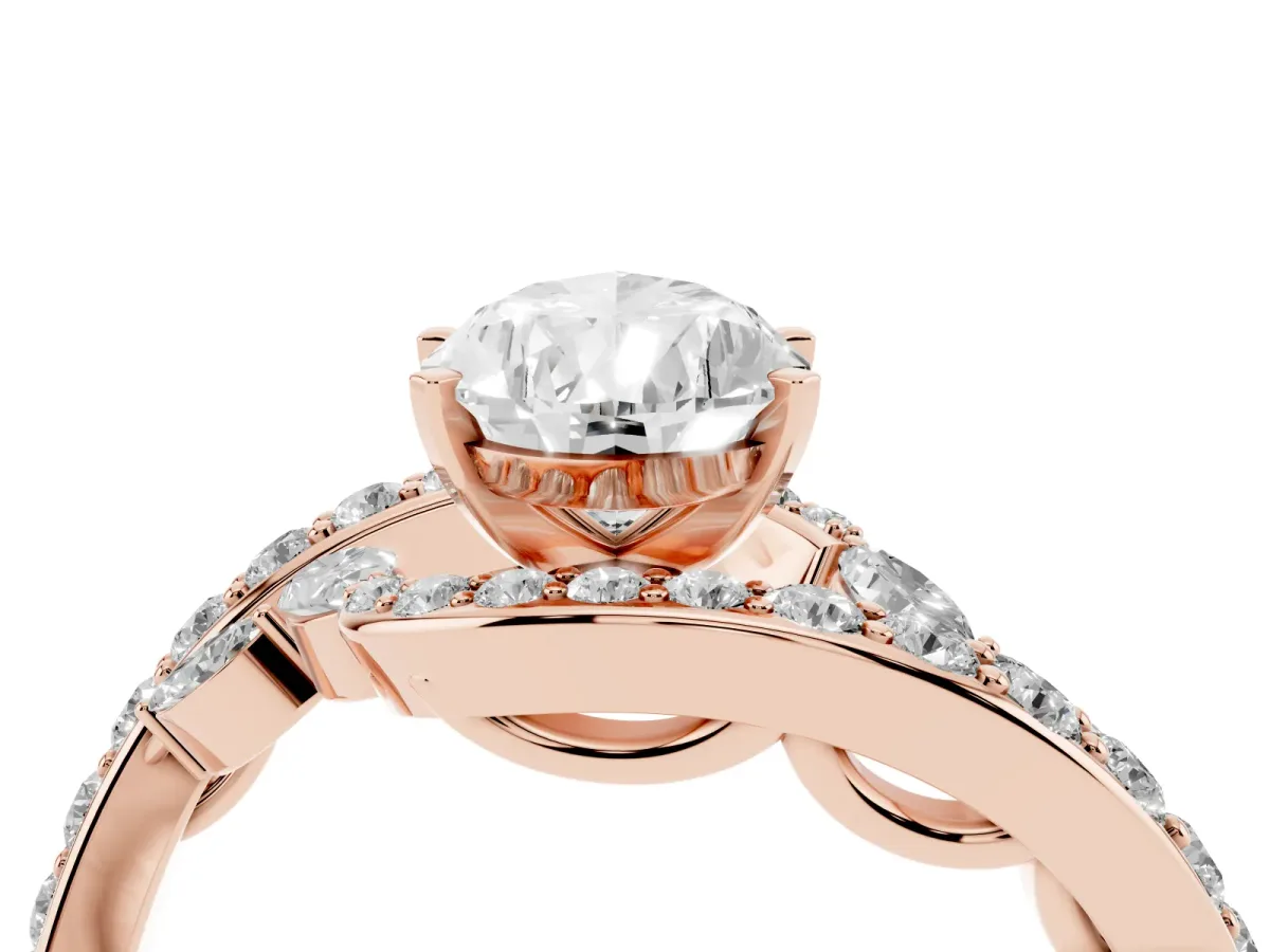 Pear Cut Solitaire with Pavé Twist Band and Four-Prong Setting Rose gold