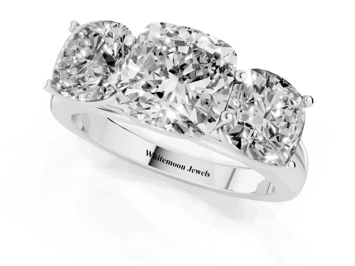 Cushion Cut Three-Stone Diamond Ring with Prong Setting on a Classic Band Silver