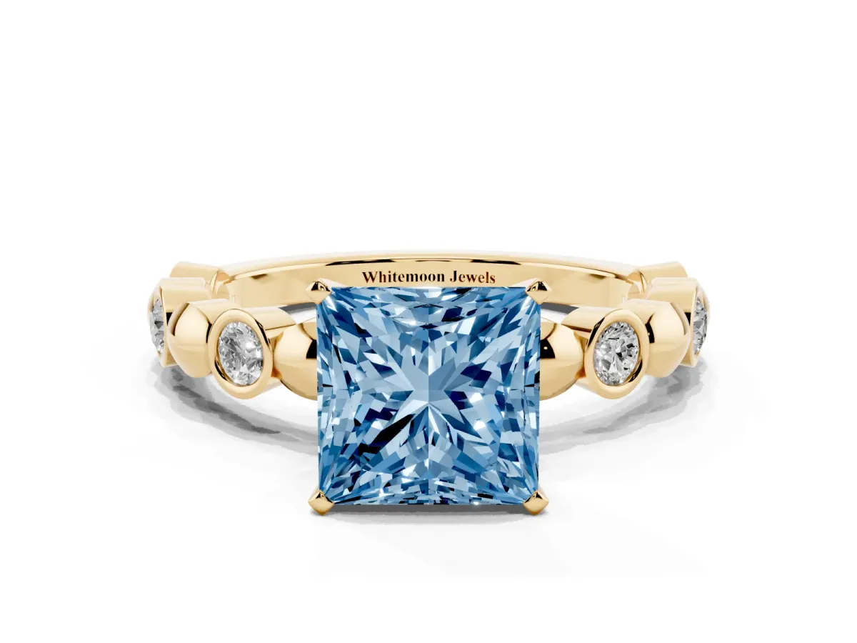 Fancy Blue Princess Cut Solitaire Bezel-Set Diamond Ring with Beaded Band and Four-Prong Setting Yellow gold