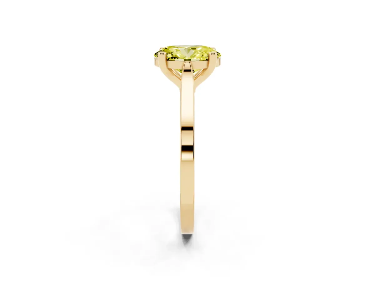Fancy Yellow Oval Cut Solitaire Diamond Ring with Four-Prong Setting and Tapered Band Yellow gold