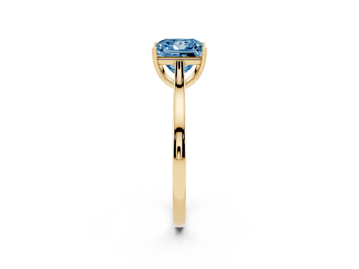 Fancy Blue Princess Cut Solitaire Heart Prong Engagement Ring with Tapered Band Yellow gold