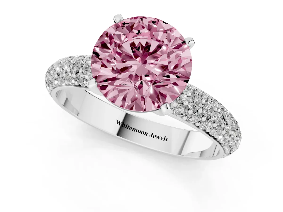 Fancy Pink Round Cut Diamond Solitaire Ring with Prong Setting and Pavé Band Silver