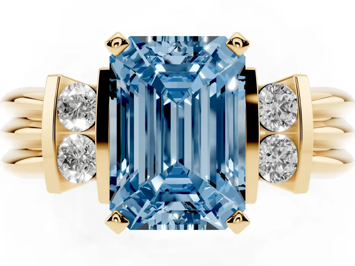 Fancy Blue Emerald Cut Cut Three-Stone Channel Set Ring with Bar Prongs Yellow gold