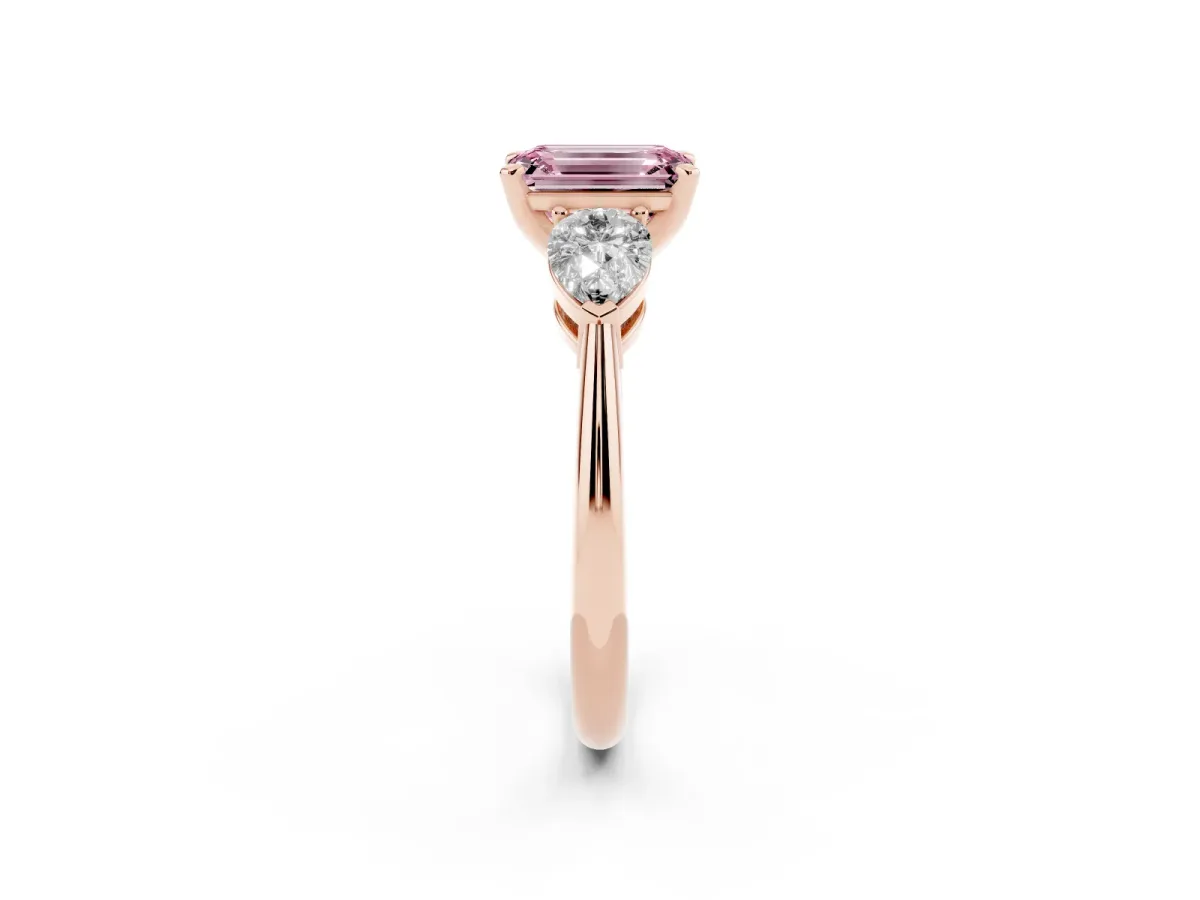 Fancy Pink Three-Stone Emerald Cut Diamond Ring with Pear Side Stones and Four-Prong Setting Rose gold