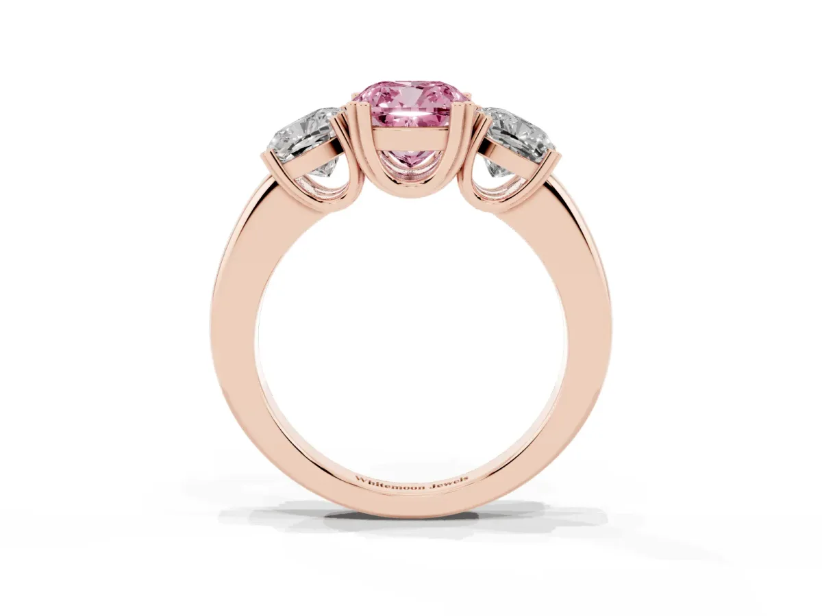 Fancy Pink Three-Stone Cushion Cut Cut Diamond Ring with Channel Set Band and Four-Prong Setting Rose gold