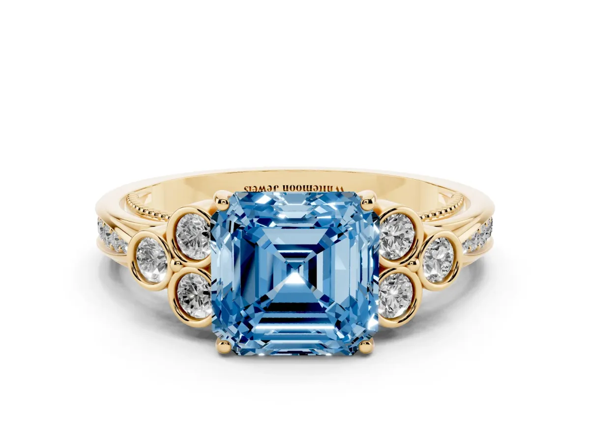 Fancy Blue Asscher Cut Cut Diamond Engagement Ring with Bezel Set Round Side Stones and Prong Setting Yellow gold