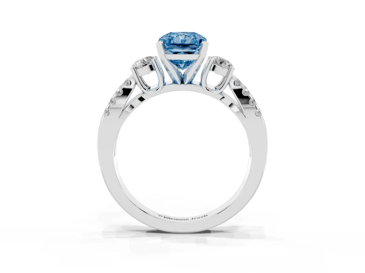 Fancy Blue Radiant Cut Diamond Three-Stone Ring with Pavé Split Shank and Four-Prong Setting White gold