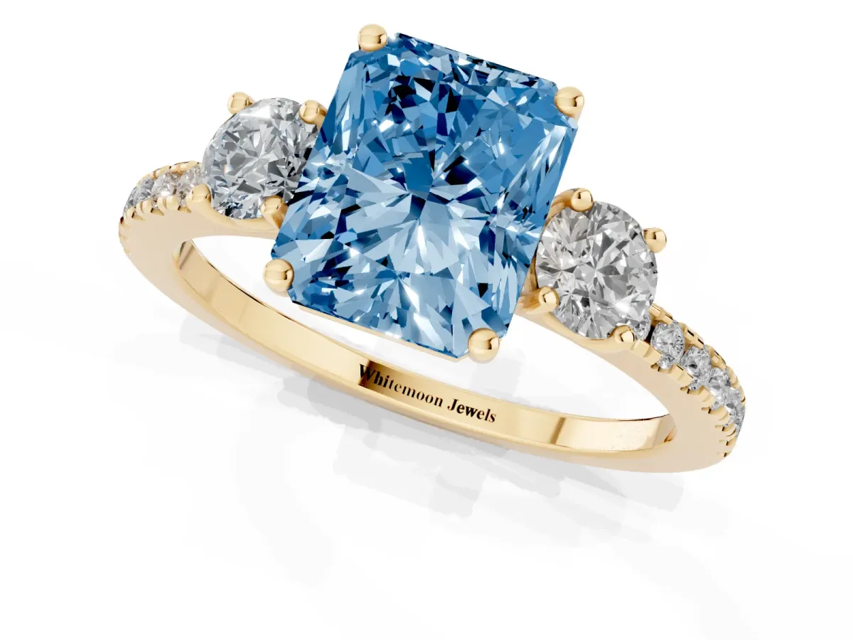 Fancy Blue Three-Stone Radiant Cut Cut Diamond Pavé Band with Prong Setting Yellow gold