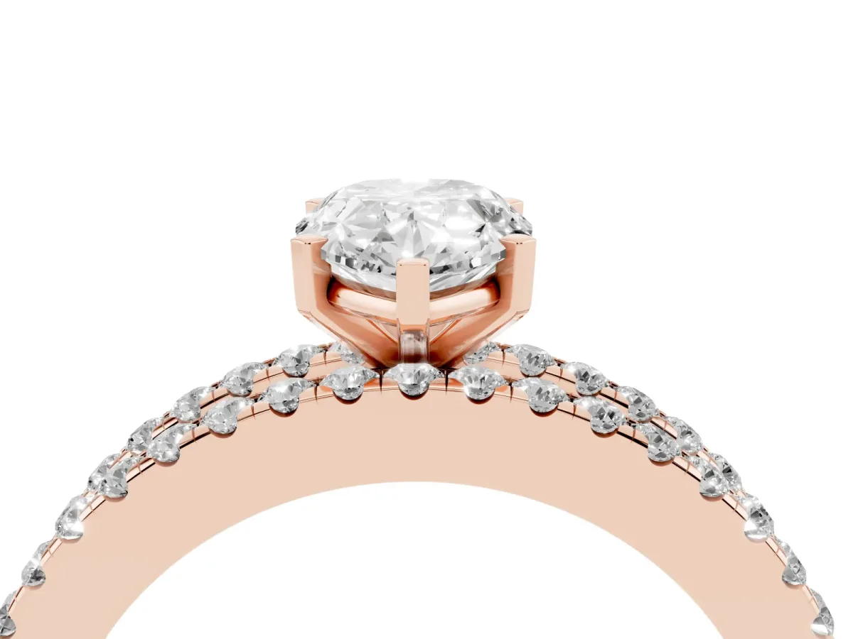 Pear Cut Diamond Solitaire Ring with Pavé and Channel Set Band Rose gold