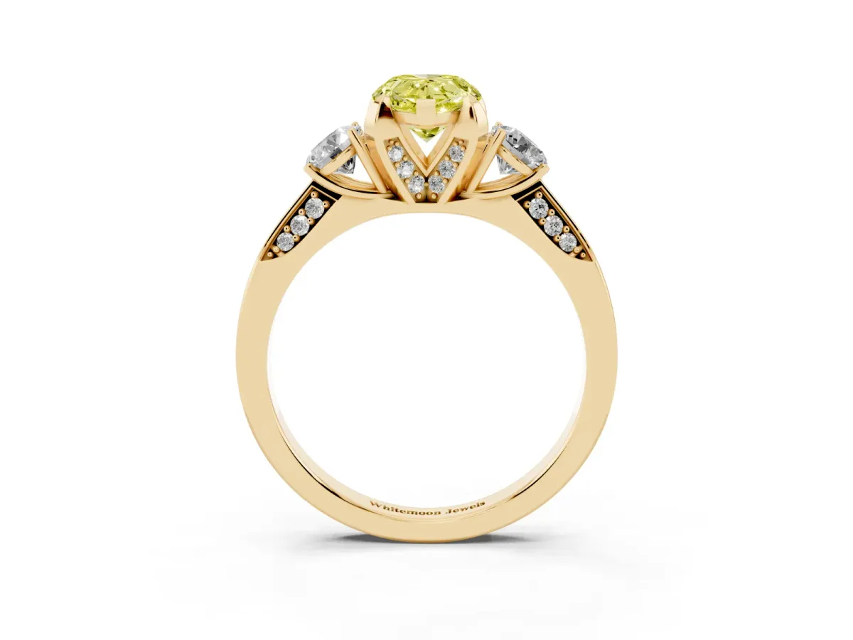 Fancy Yellow Pear Cut Brilliant Three-Stone Diamond Ring with Pavé Band and Four-Prong Setting Yellow gold