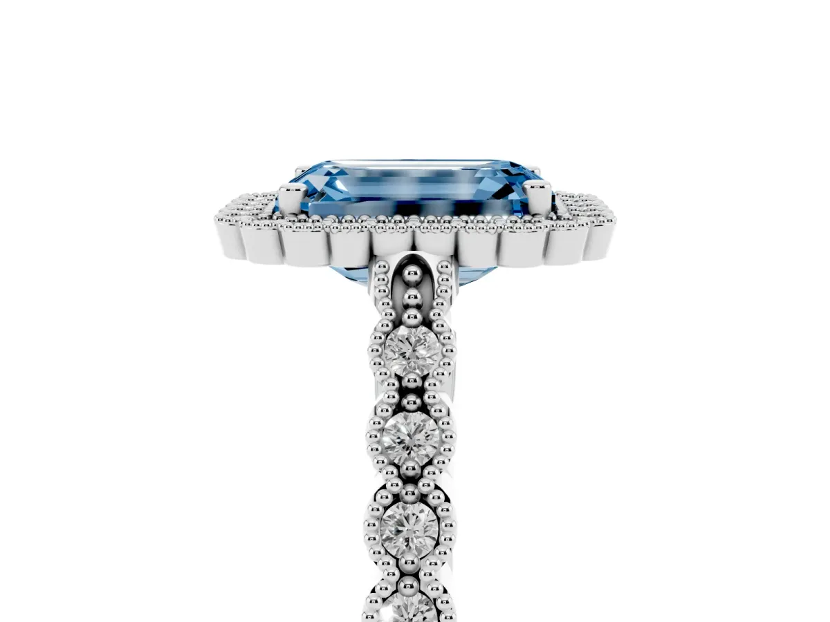 Fancy Blue Emerald Cut Cut Halo Pavé Solitaire Ring with Milgrain Band Silver