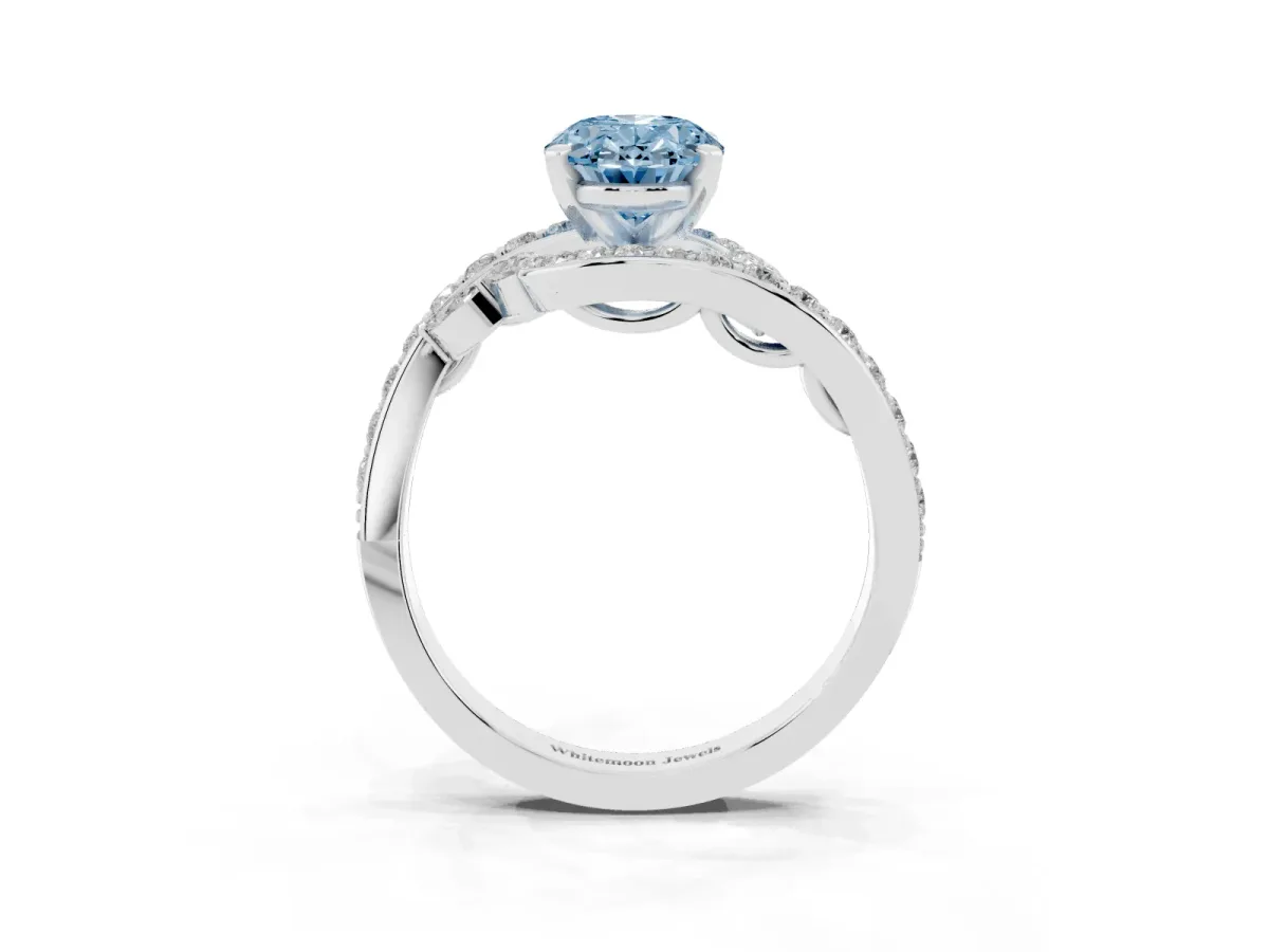 Fancy Blue Oval Cut Solitaire with Pavé Twist Band and Four-Prong Setting Silver