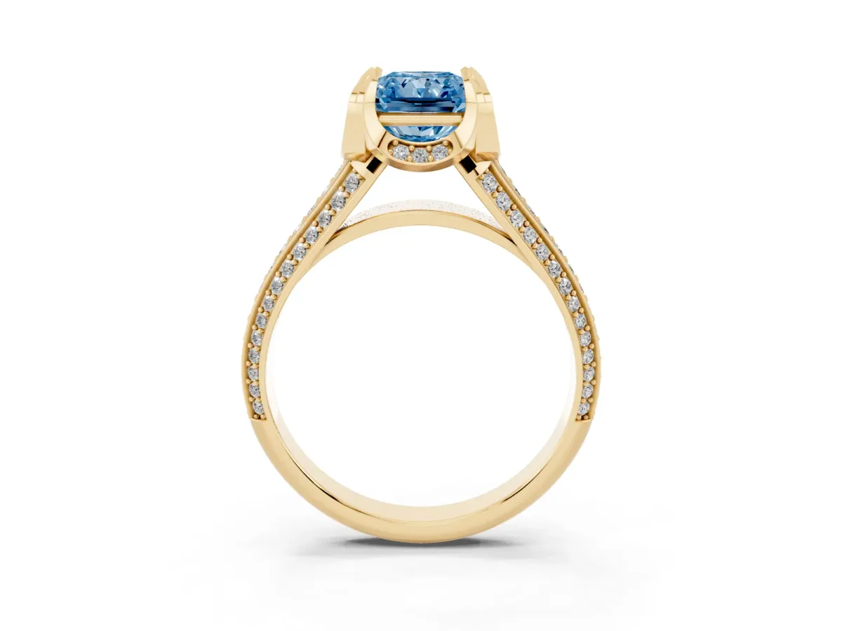 Fancy Blue Radiant Cut Solitaire Pave Split Shank Ring with Four-Prong Setting Yellow gold