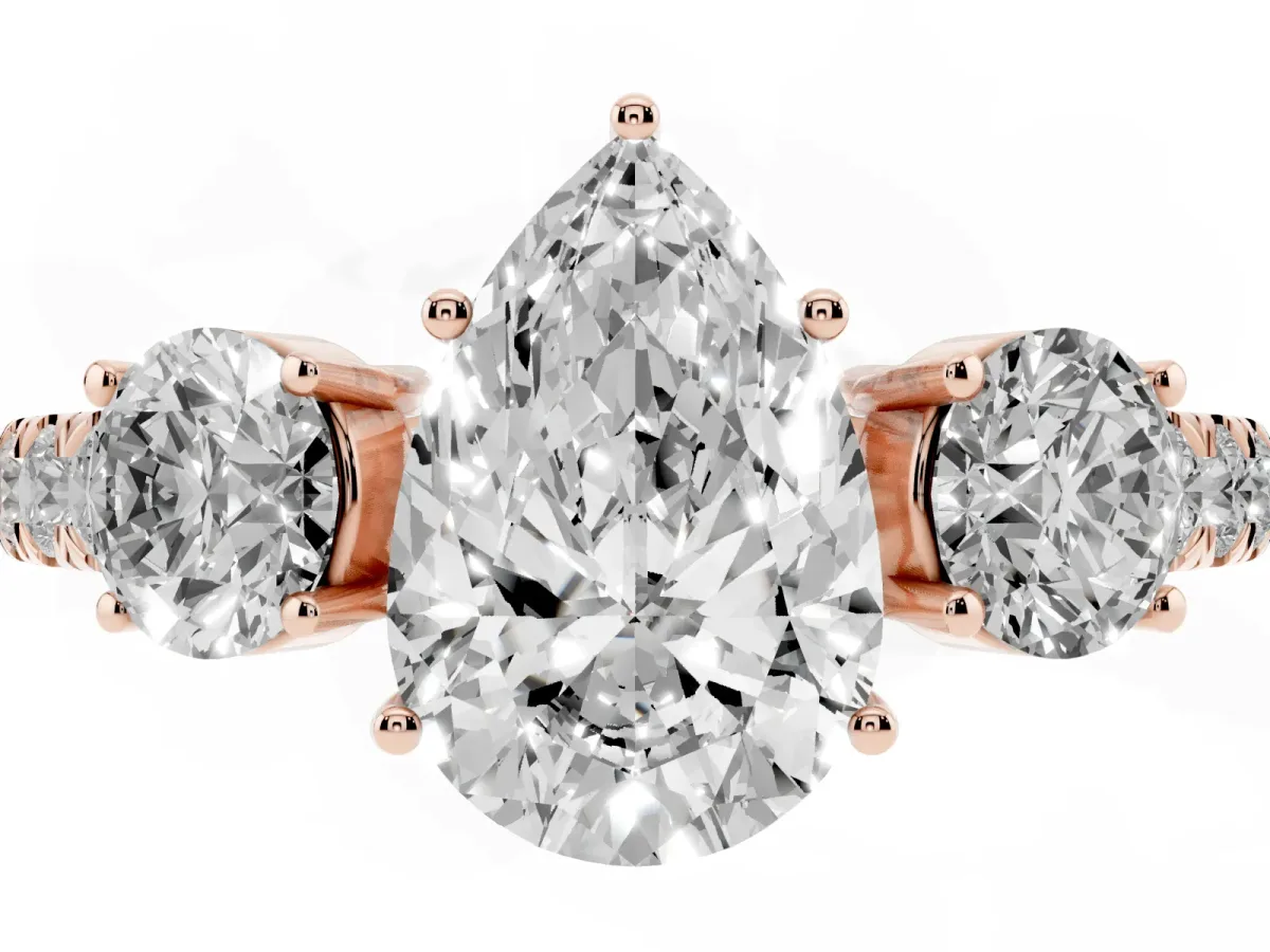 Pear Cut Cut Diamond Three-Stone Ring with Round Side Stones and Pavé Band Rose gold