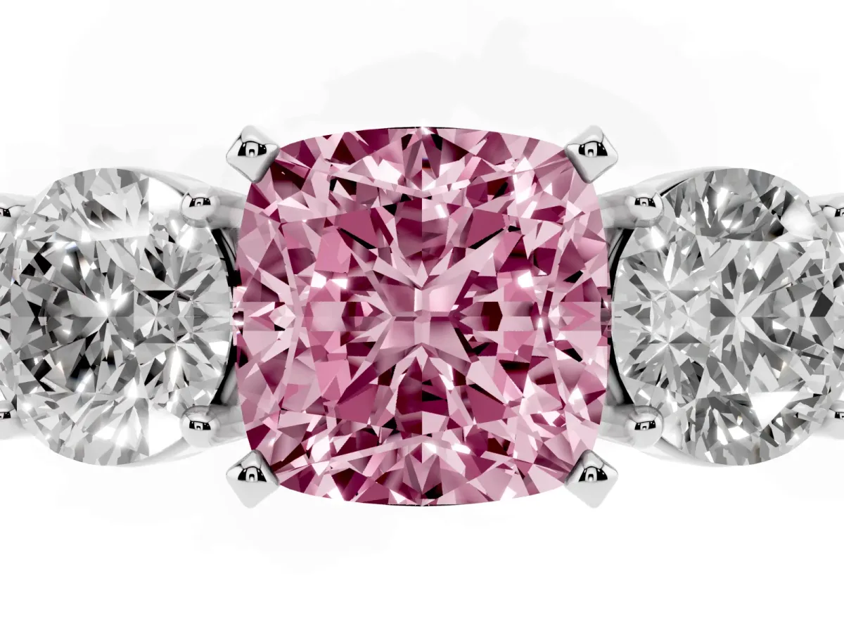 Fancy Pink Three-Stone Cushion Cut Diamond Ring with Round Side Stones, Classic Band, and Four-Prong Setting White gold