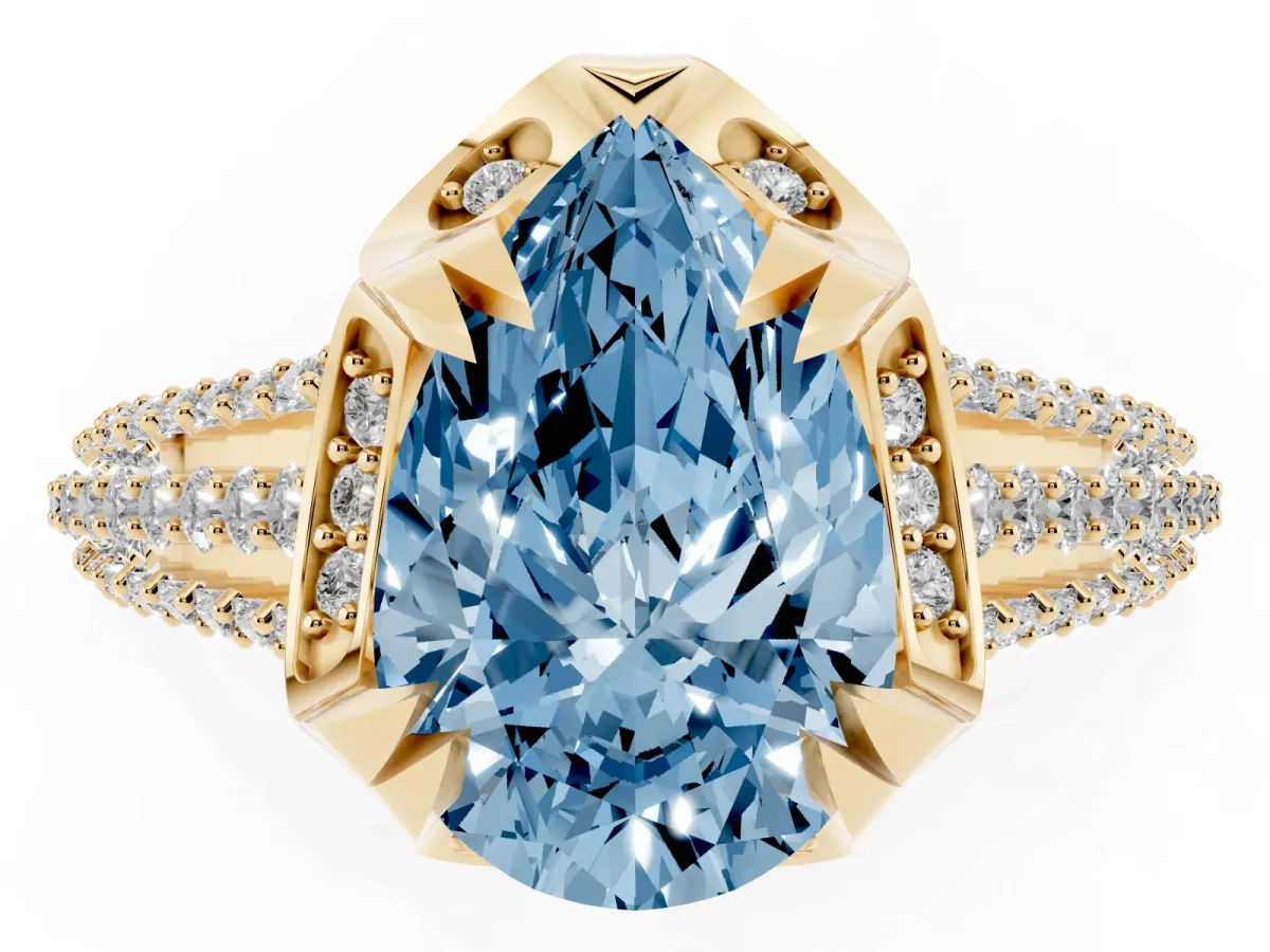Fancy Blue Pear Cut Solitaire Pave Split Shank Ring with Four-Prong Setting Yellow gold