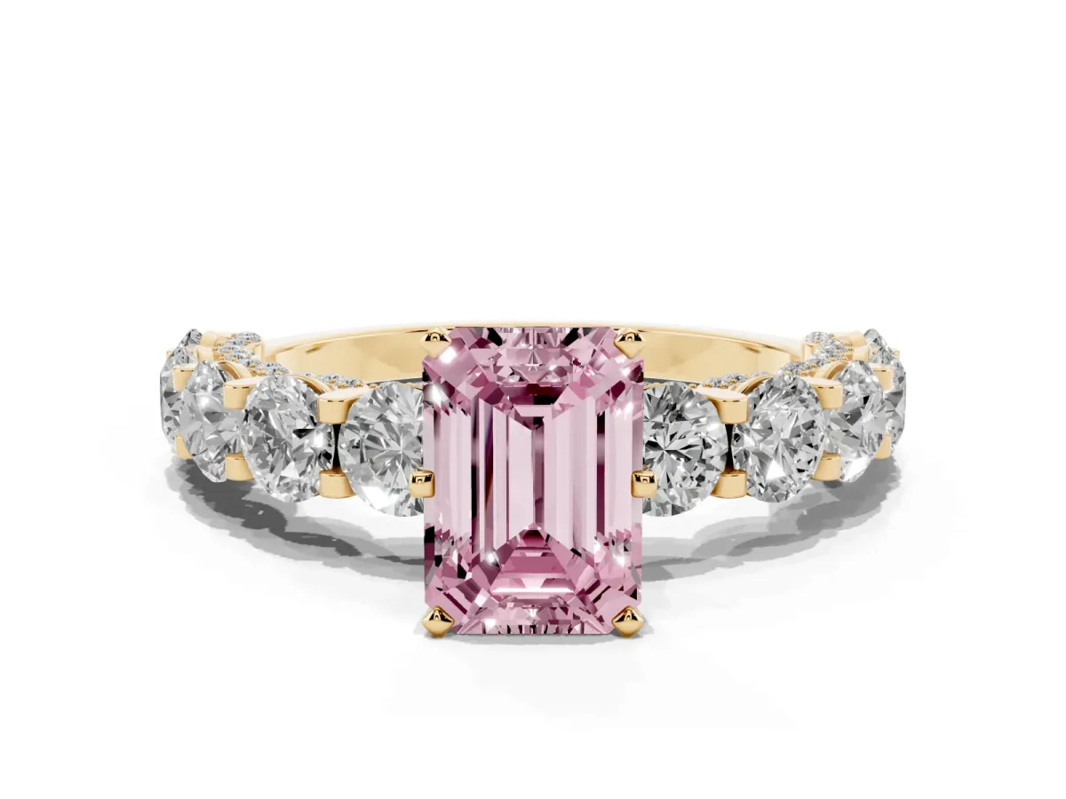 Fancy Pink Emerald Cut Diamond Side Stone Engagement Ring with Four-Prong Setting Yellow gold