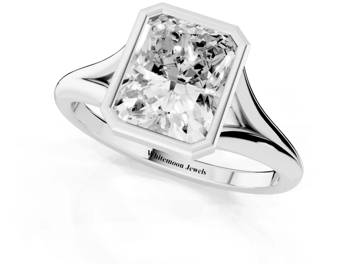 Bezel Set Radiant Cut Cut Solitaire Ring with Tapered Band Silver