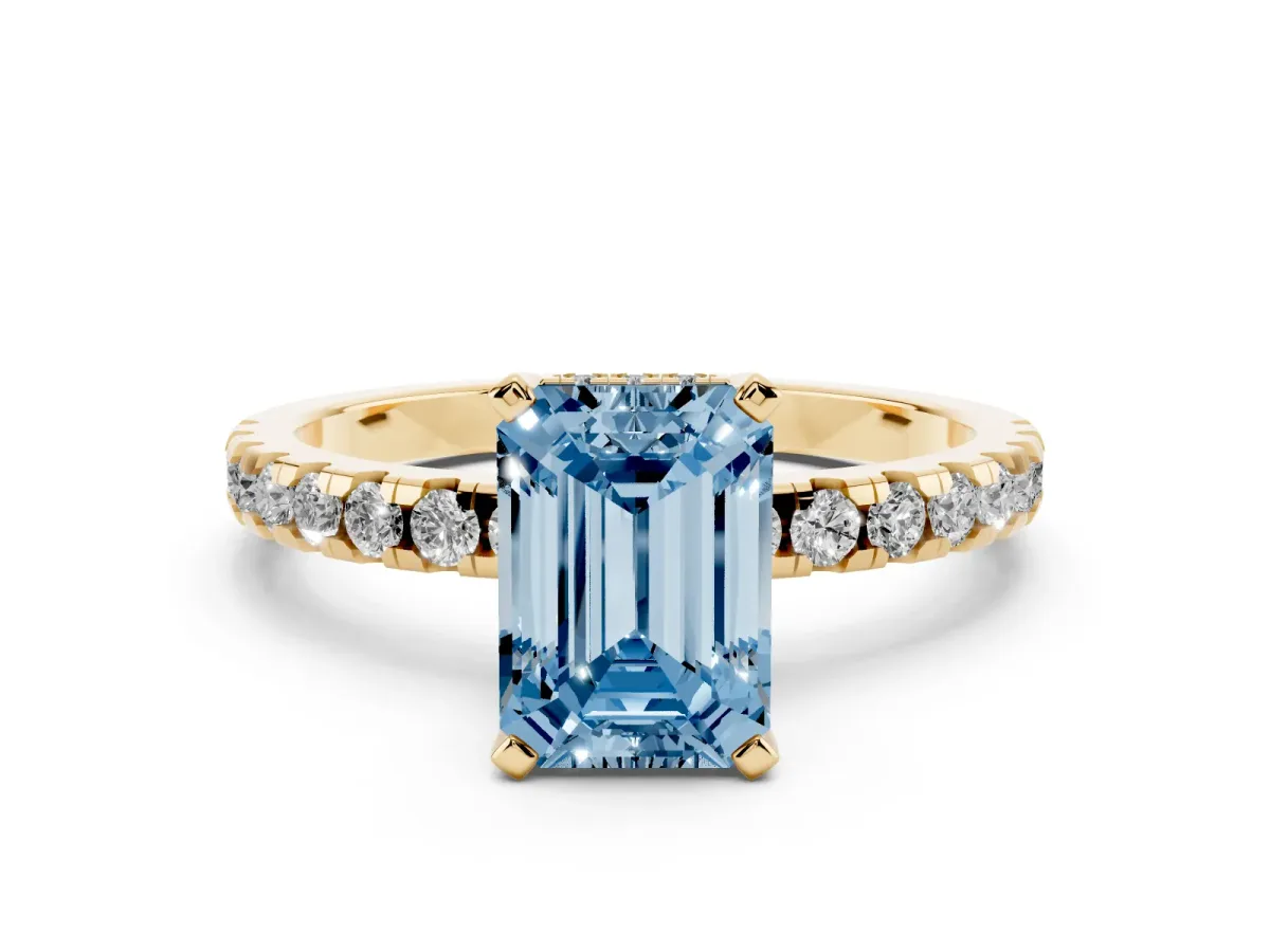 Fancy Blue Emerald Cut Diamond Solitaire Ring with Round Pavé Band and Four-Prong Setting Yellow gold