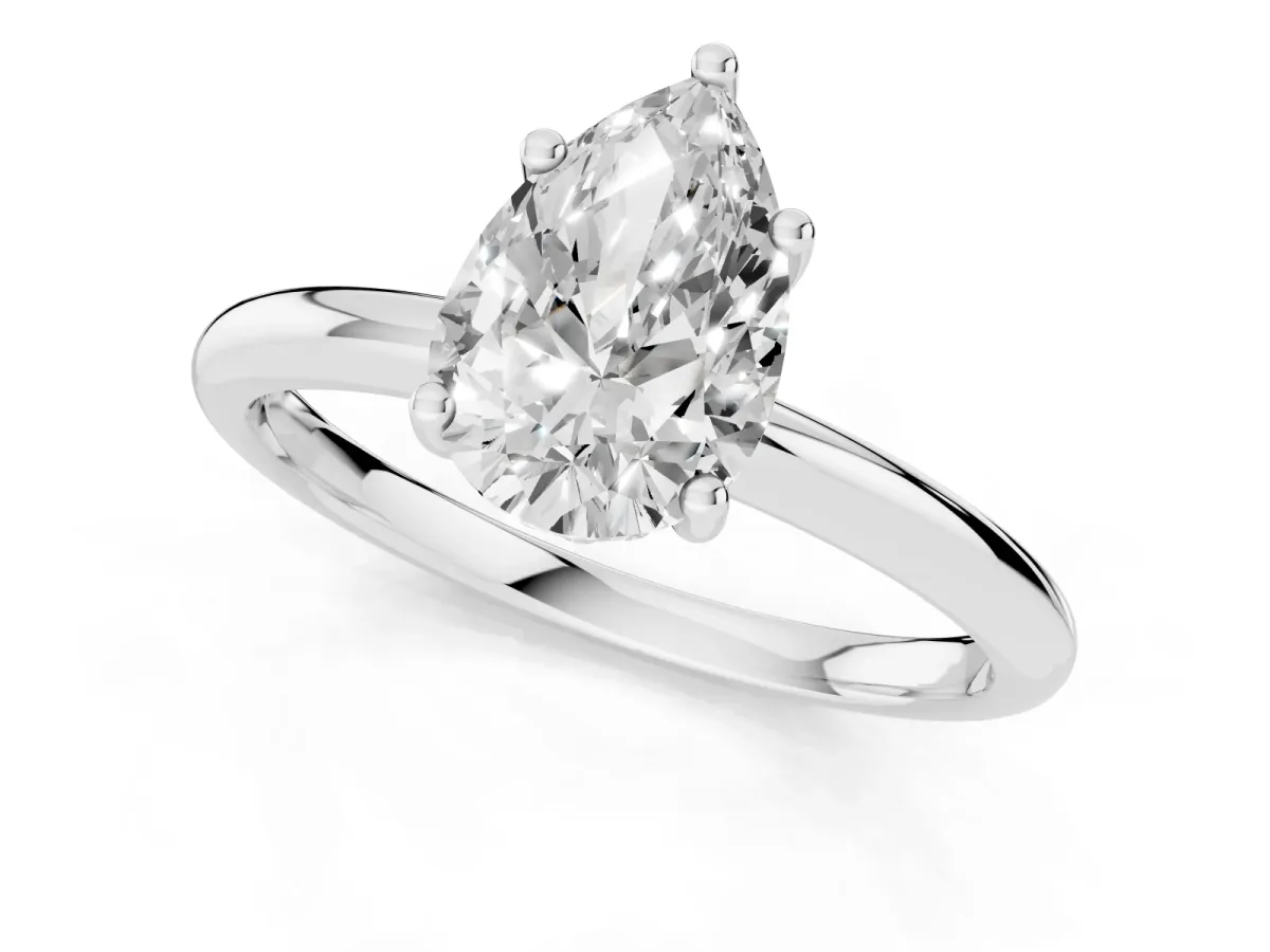 Pear Cut Cut Solitaire Engagement Ring with Four-Prong Setting and Classic Band Silver