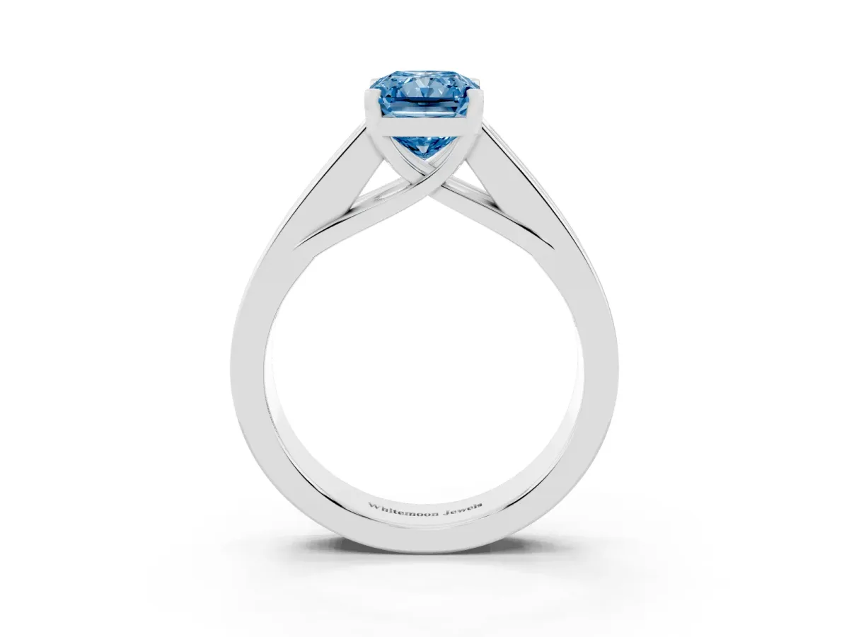 Fancy Blue Radiant Cut Cut Channel Set Solitaire Ring with Four-Prong Setting Silver