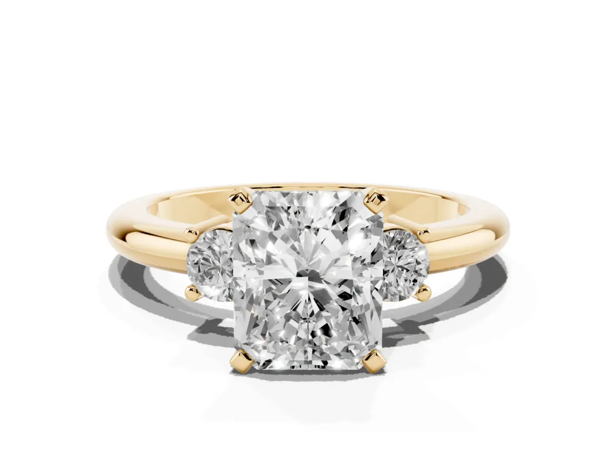 Three-Stone Radiant Cut Cut Diamond Solitaire with Prong Setting and Classic Band Yellow gold