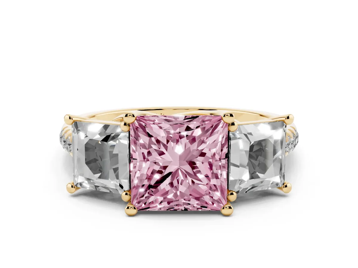 Fancy Pink Three-Stone Princess Cut Diamond Ring with Round Pavé Band and Prong Setting Yellow gold